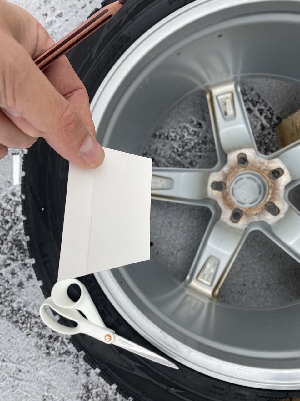 Preparing a wedge for measuring the wheel center bore